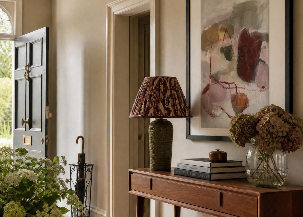 Abstract art print in a warm, characterful interior