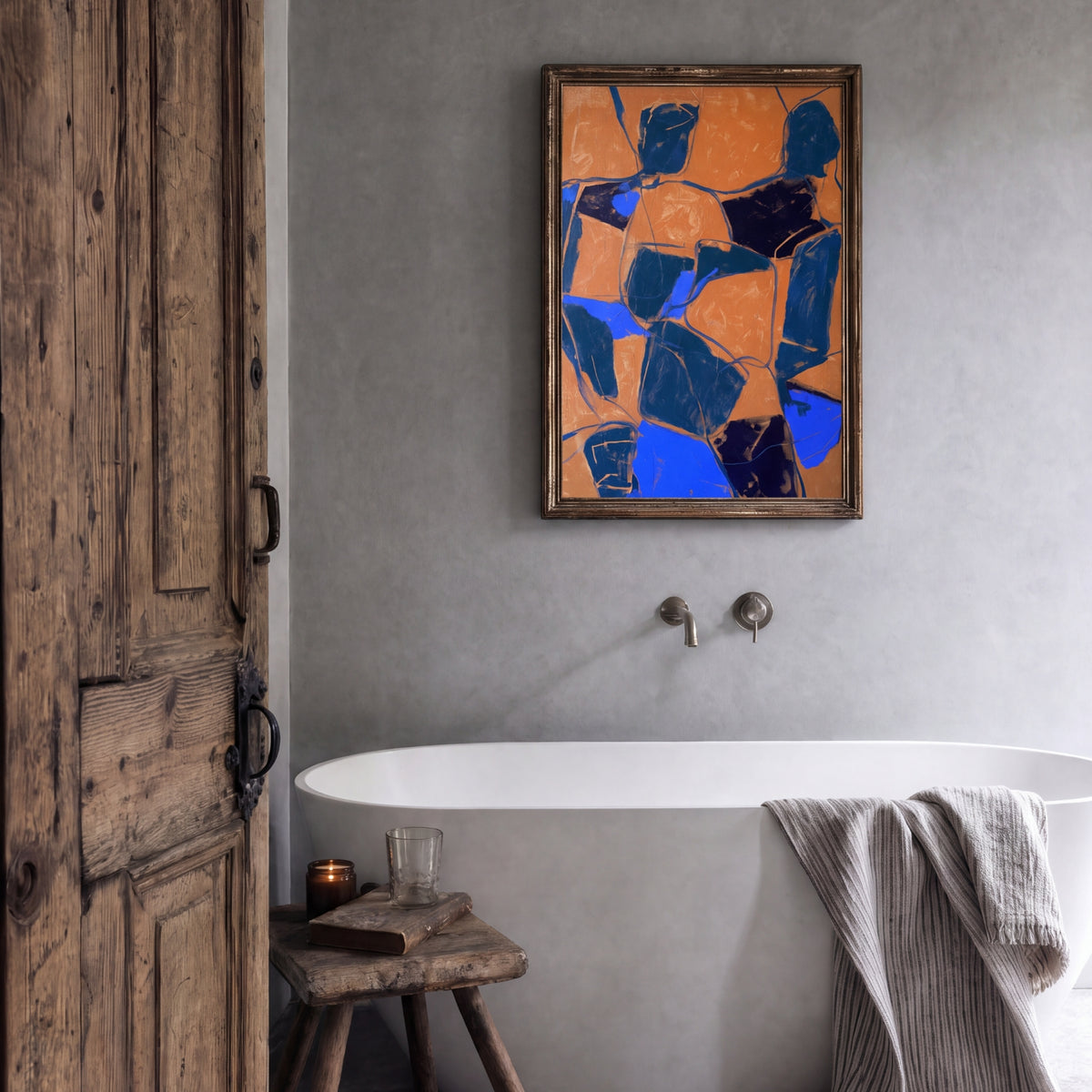 Composition: Cobalt, No. 1 – abstract art print in navy and ochre in bathroom