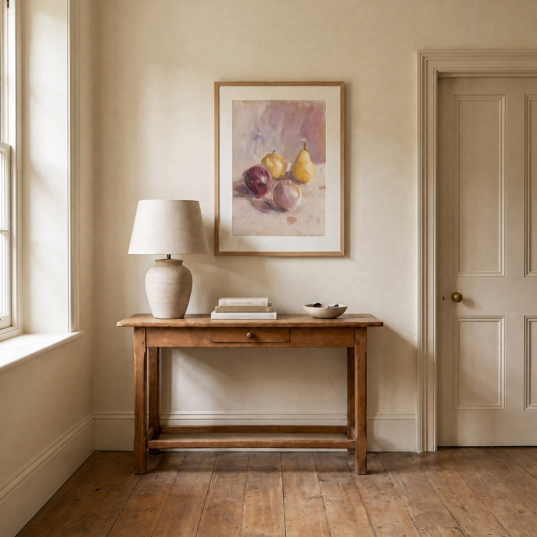 Pears, No. 1 – still life art print in beige and purple in hallway above console table