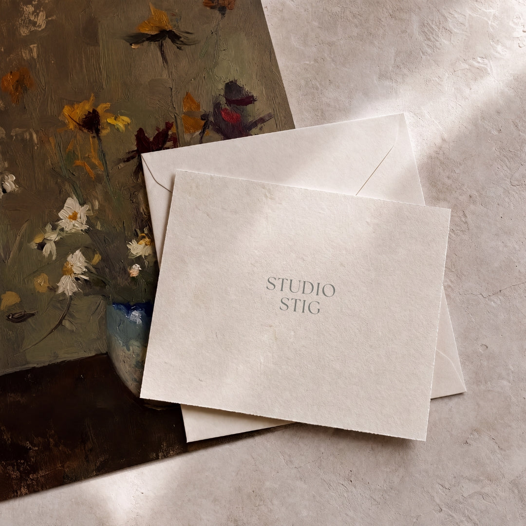 StudioStig digital art gift card with textured ivory envelope and vintage landscape art print